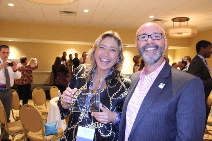 Chris Delboni with SJMC Dean Raul Reis. Photo by Marisol Medina.